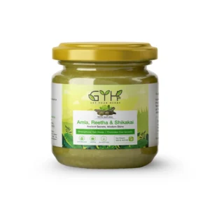 A glass jar of Get Your Herbs Amla, Reetha & Shikakai hair mask with a gold lid, showcasing its 100% natural formula for hair growth.