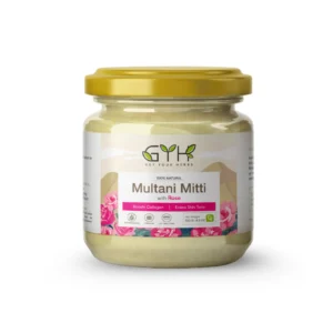 A glass jar of Get Your Herbs 100% Natural Multani Mitti with Rose, a face pack designed to boost collagen and even out skin tone.